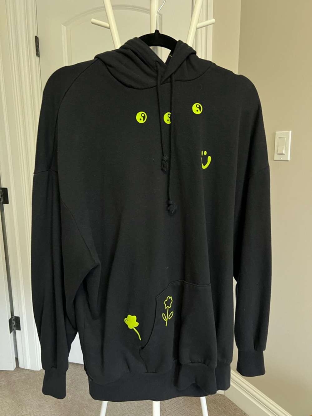Levi's Black Hoodie with Neon Yellow-Green Smiley & Floral Graphics